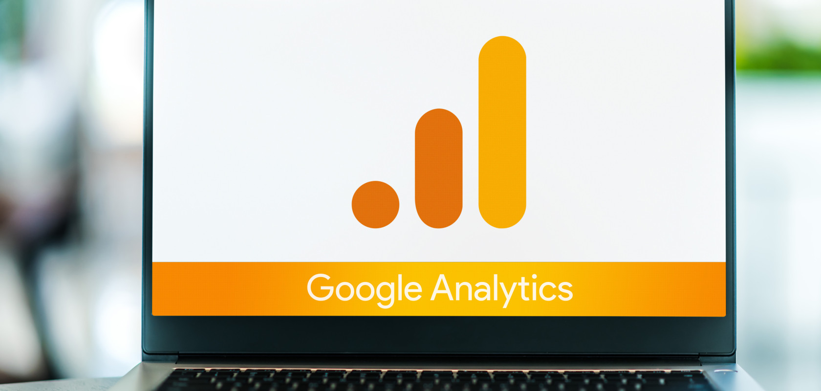 Laptop computer displaying logo of Google Analytics